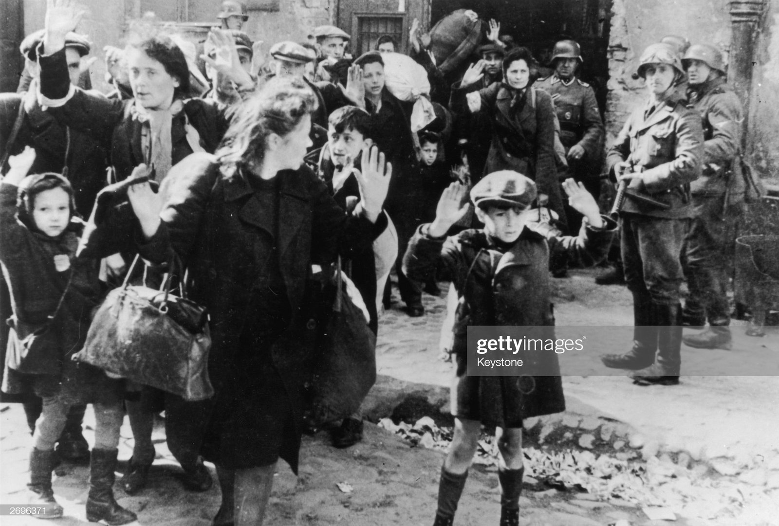 Jews from the Warsaw ghetto surrender to German soldiers after the Warsaw Ghetto Uprising of April-May 1943. On the right is SS Josef Blösche (1912 - 1969).   (Photo by Keystone/Hulton Archive/Getty Images)